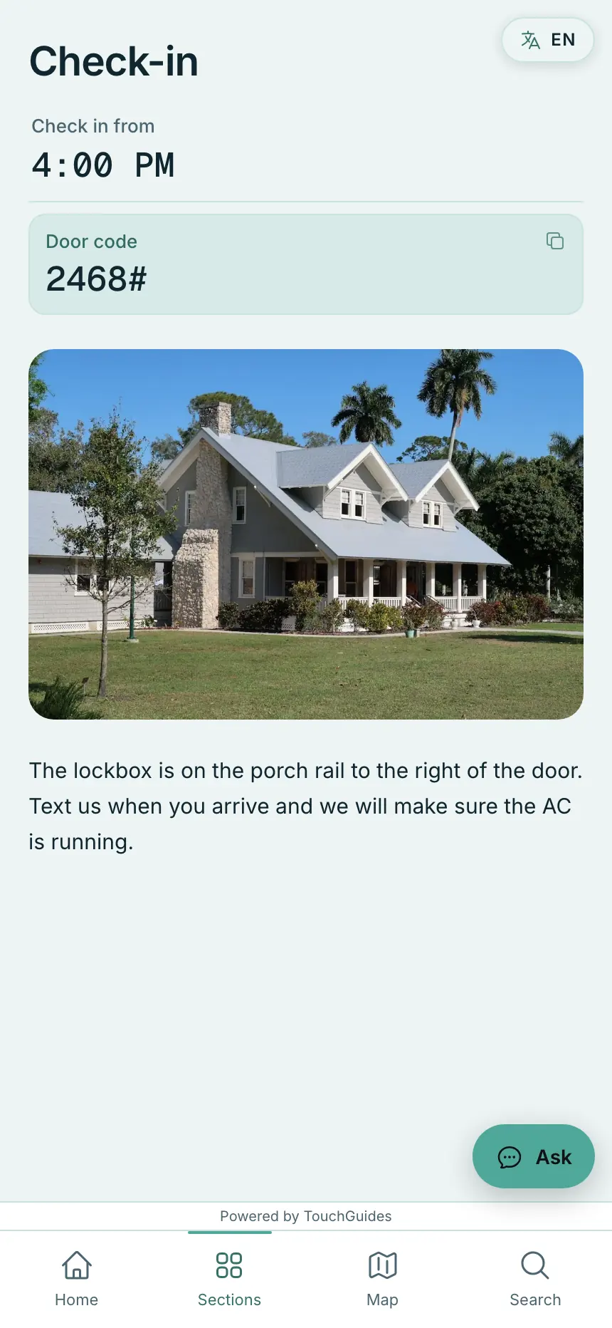 The check-in section of a guidebook: the arrival time, the door code with a copy button, a photo of the house and the host's instructions